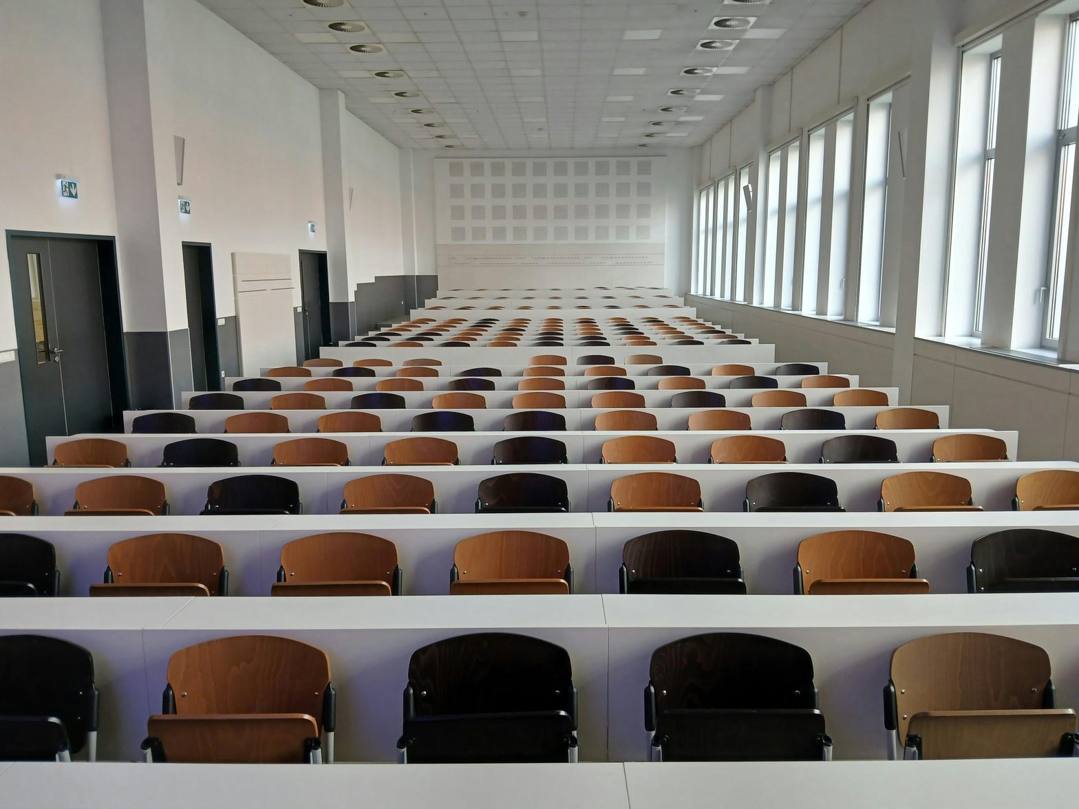 Empty lecture hall, rows of seats