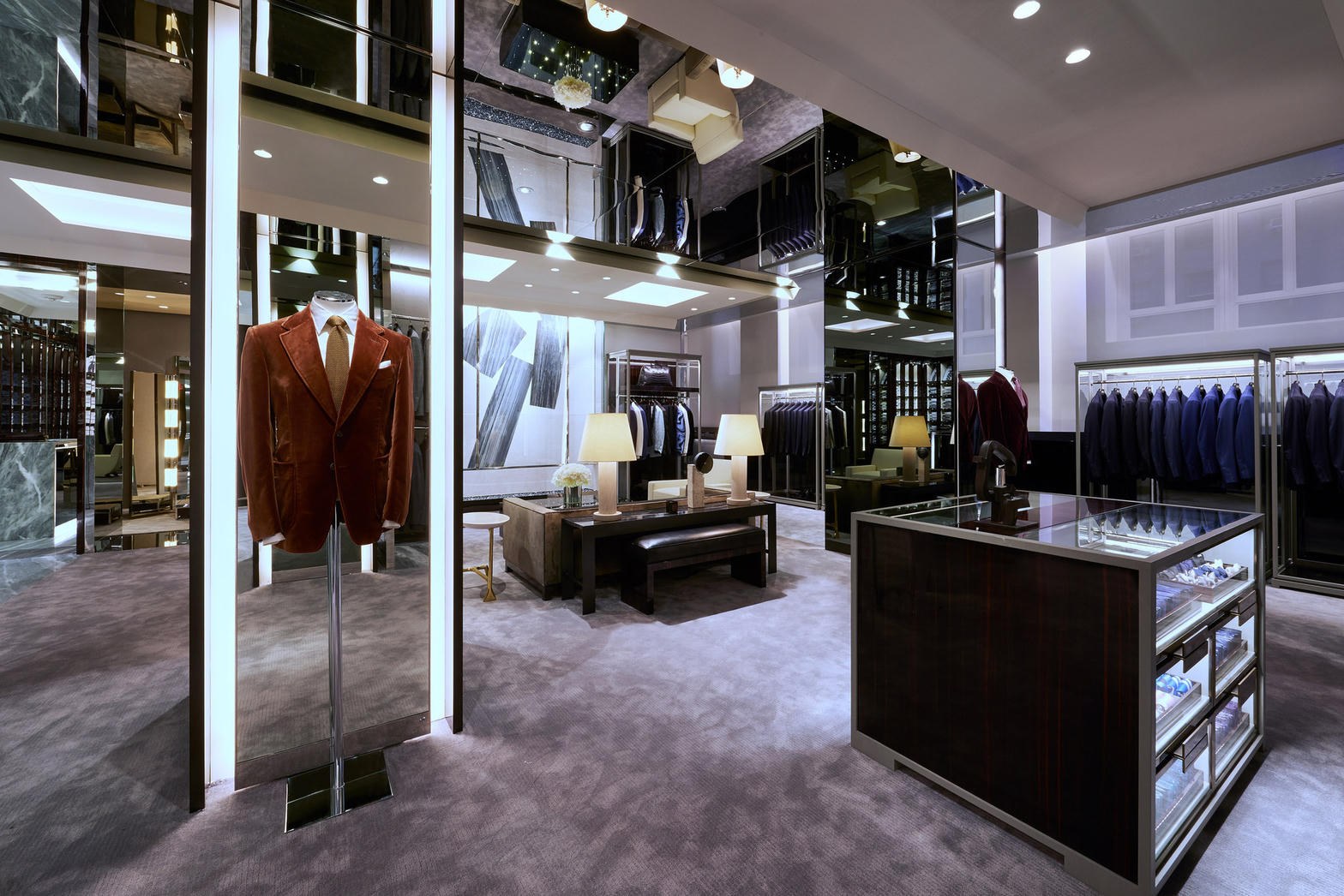 Tom Ford boutique floor — suiting, light, the room as a sales channel
